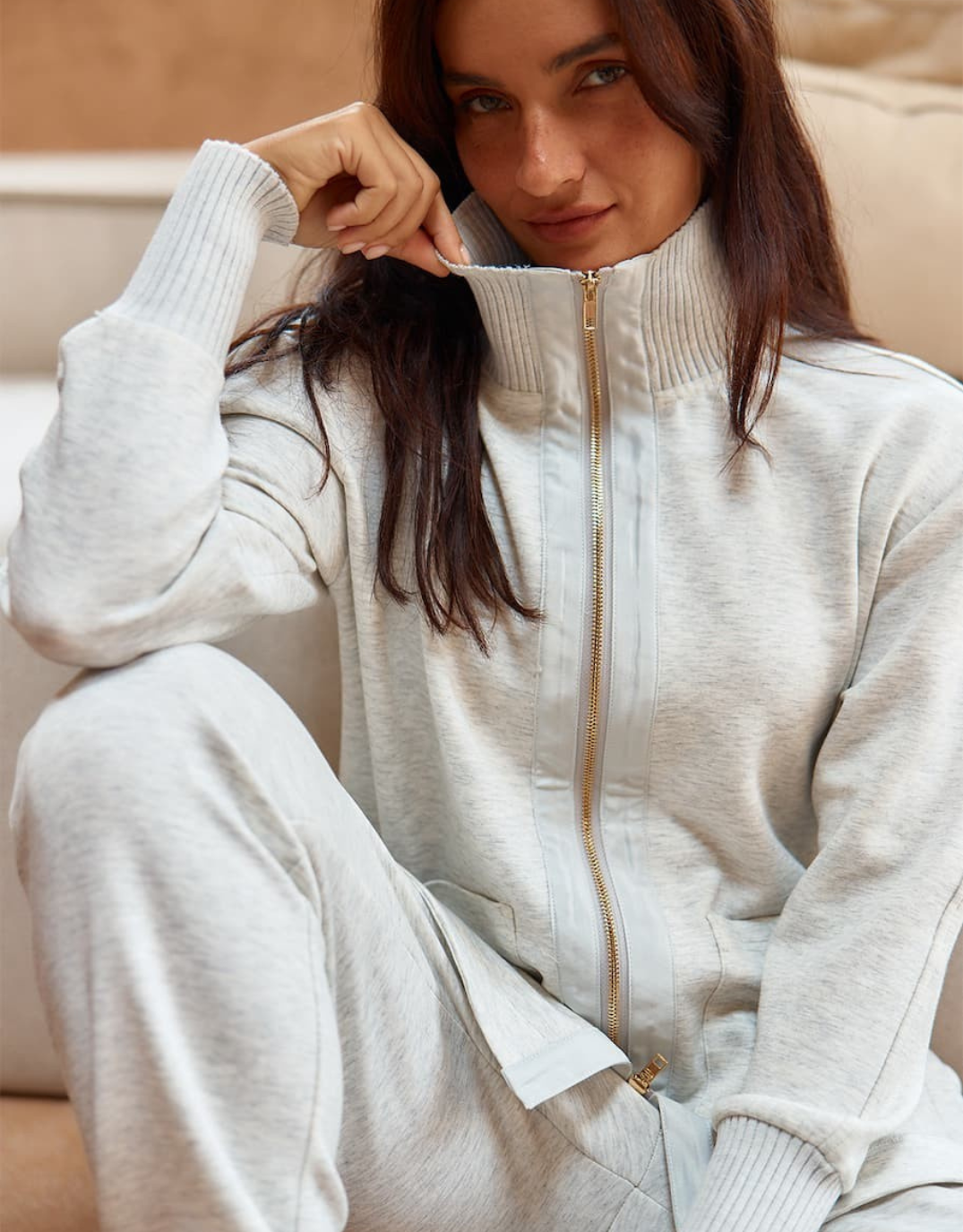 Image of a model wearing Outerwear. Product name - Sabina Sweatshirt Grey Marle in Grey Marle colour by brand - Betty Basics