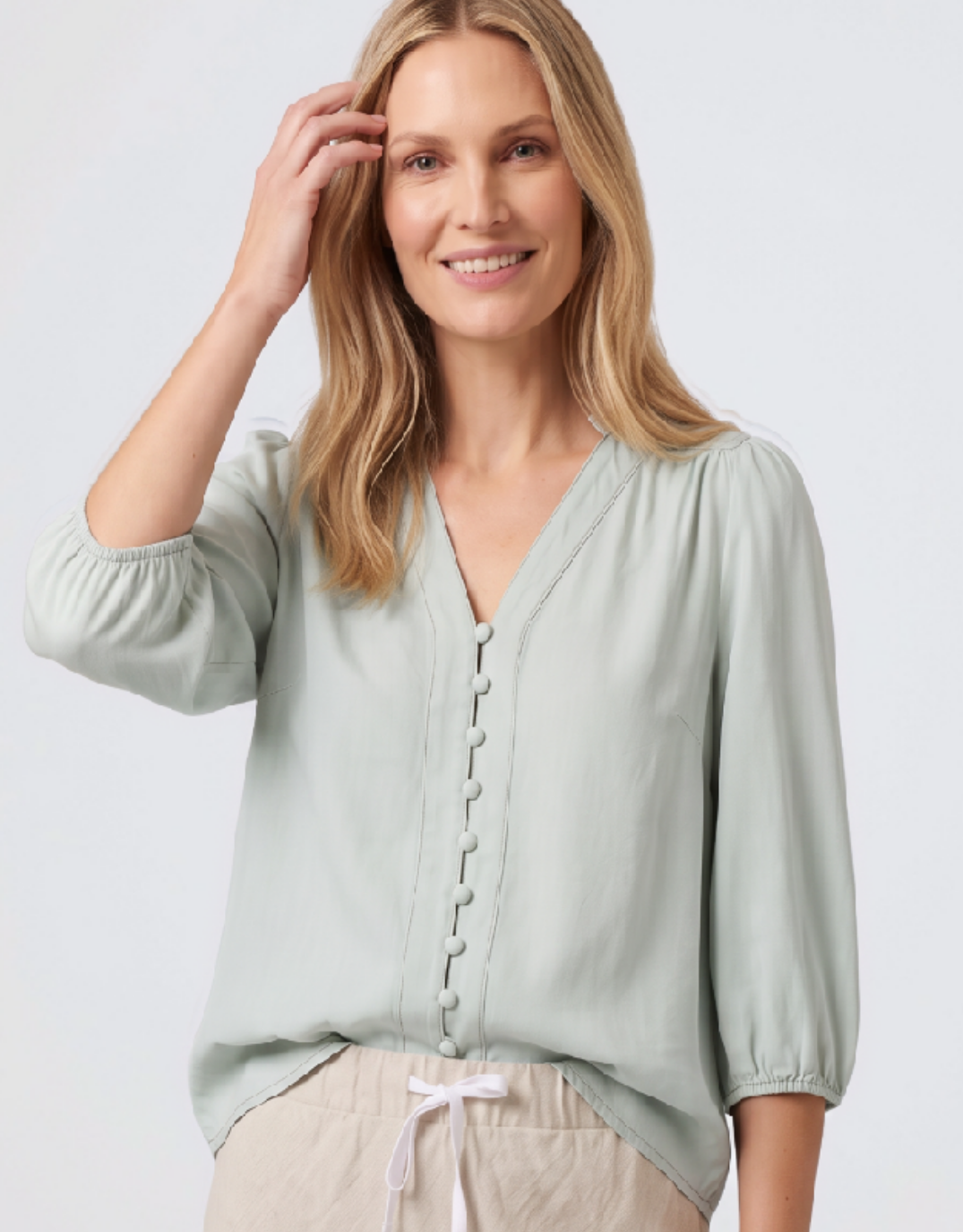Image of a model wearing Tops. Product name - Selene Tencel Blouse Blue Glass in Blue Glass colour by brand - G.D.S