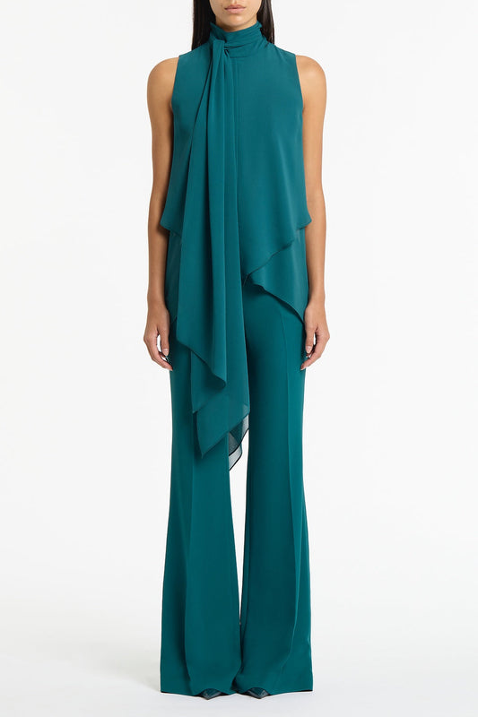 Image of a model wearing Tops. Product name - Serpentine Georgette Tie Top in Green colour by brand - Carla Zampatti