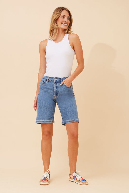 Image of a model wearing Shorts. Product name - RINI DENIM SHORTS in Light Denim colour by brand - INFINITY DENIM