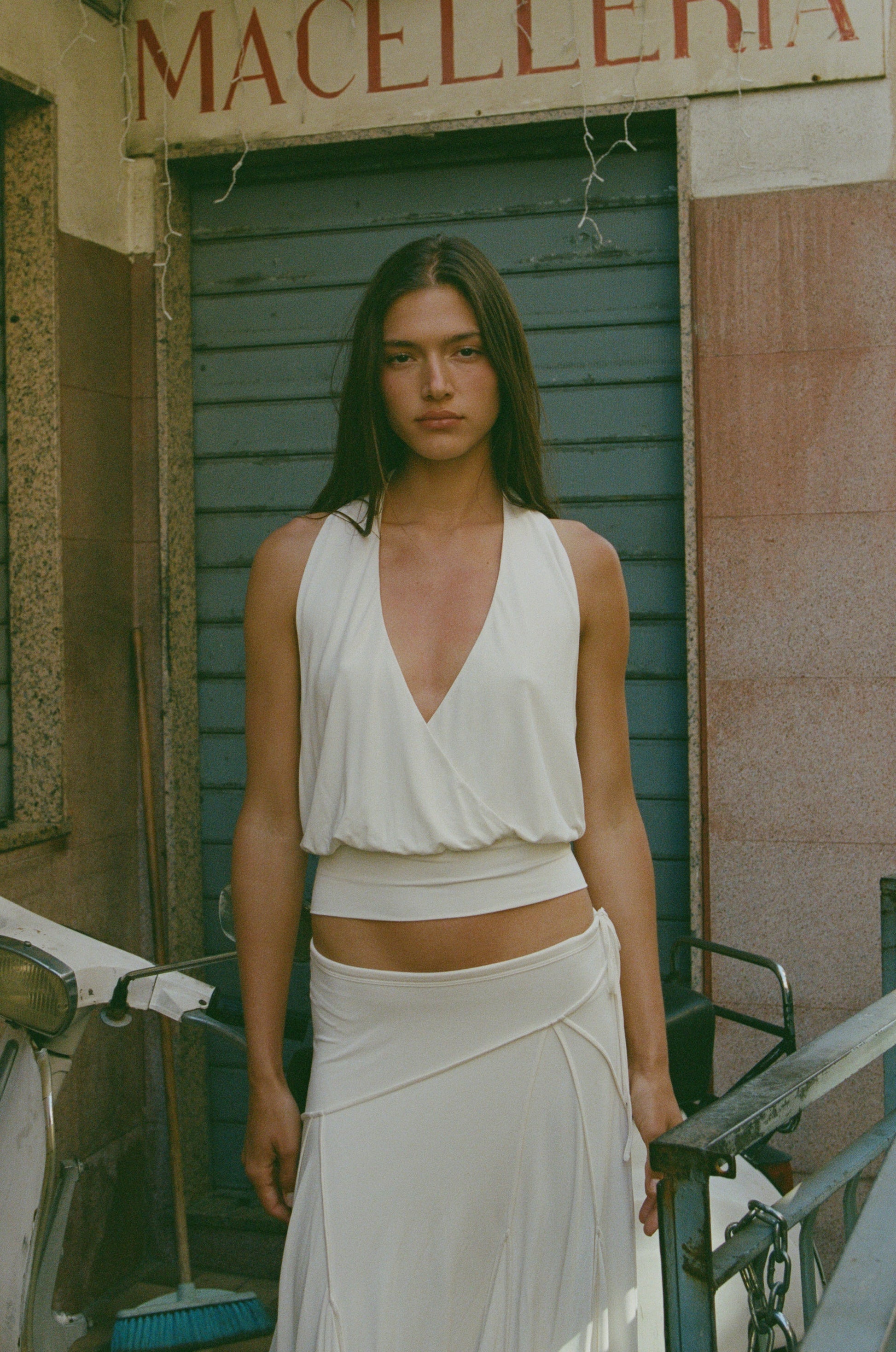 Image of a model wearing Tops. Product name - Sharni Top in Off White colour by brand - With Jéan