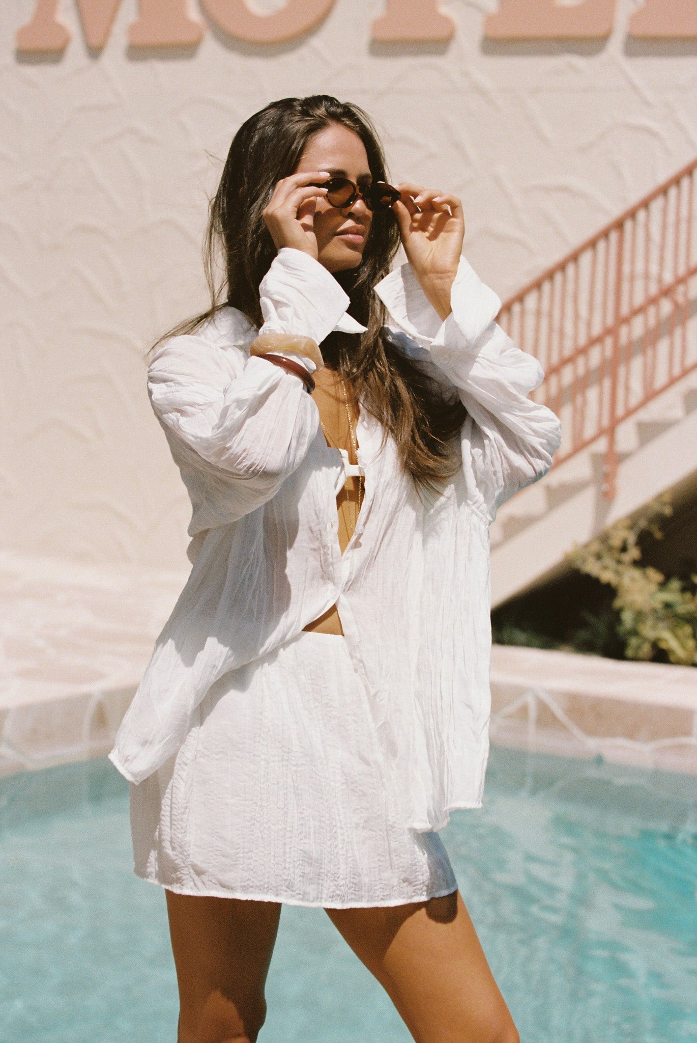 Image of a model wearing Skirts. Productname: SNDYS BRANDI MINI SKIRT in White colour by brand - SNDYS