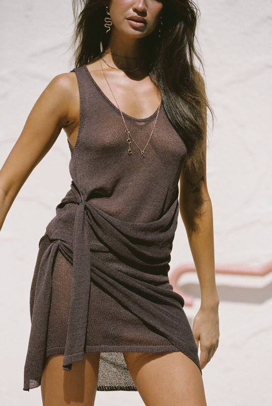 Image of a model wearing Skirts. Productname: SNDYS MINDY WRAP MINI SKIRT in Chocolate colour by brand - SNDYS