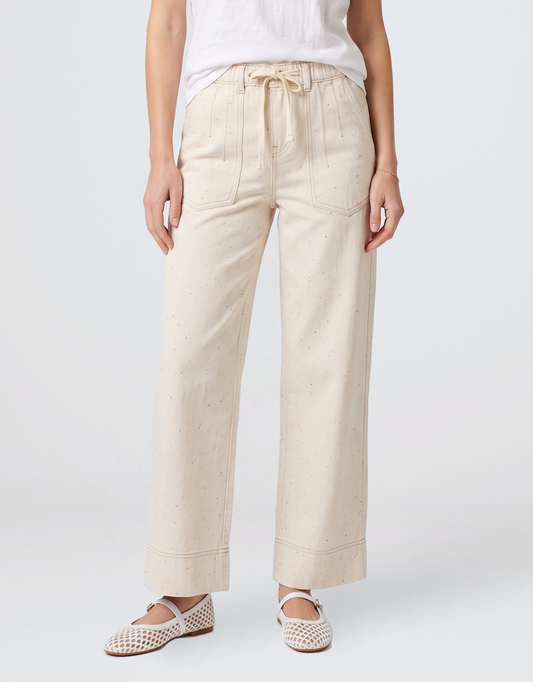 Image of a model wearing Pants. Product name - Sofia Pant Sand/Neon Speck in Sand/Neon Speck colour by brand - Kireina