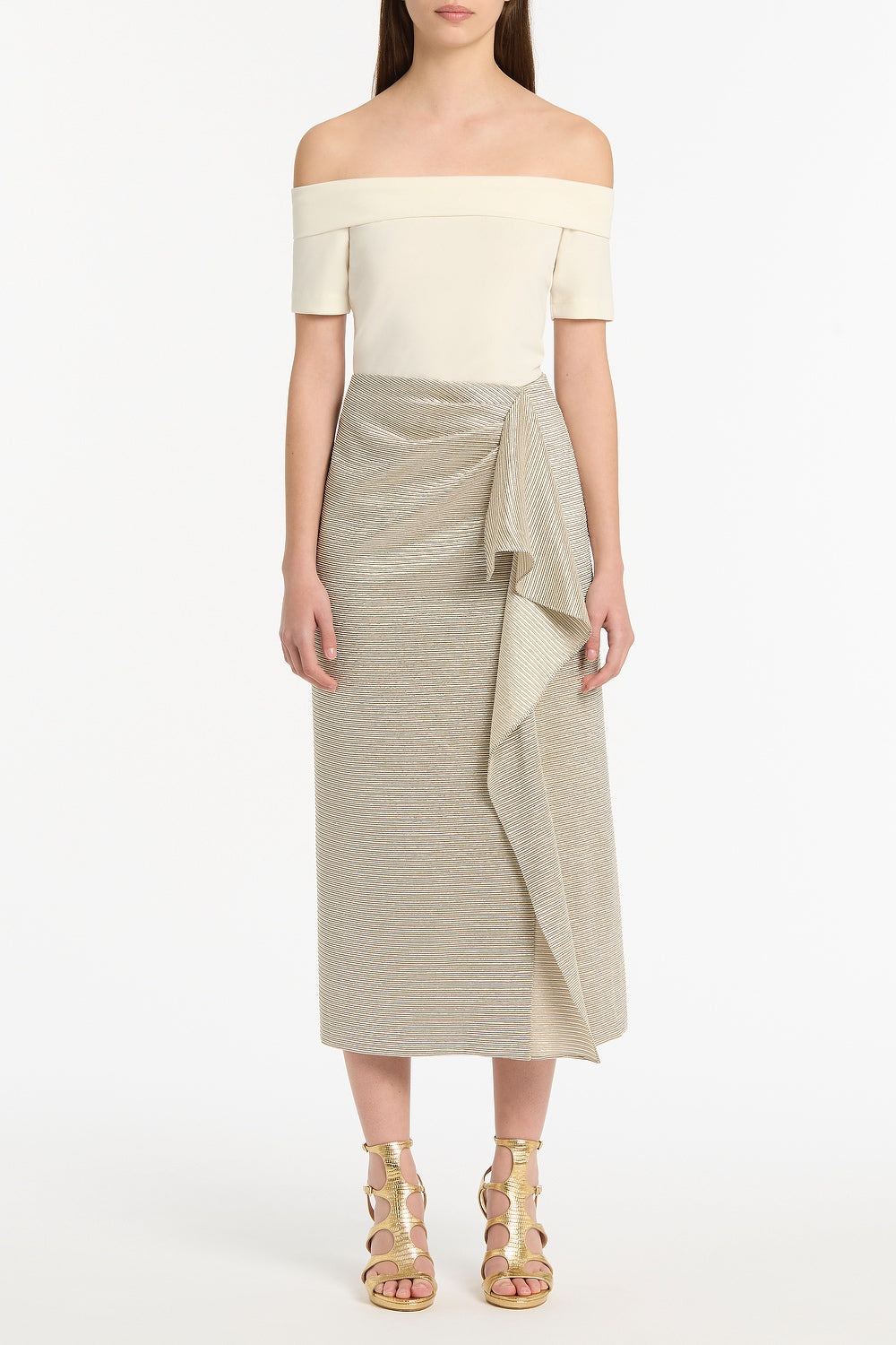 Image of a model wearing Skirts. Product name - Striped Gold Ruffle Front Skirt in Gold colour by brand - Carla Zampatti
