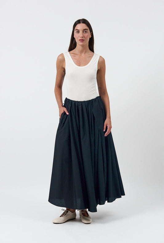 Image of a model wearing Skirts. Product name - Daisy Skirt Black in Black colour by brand - Silk Laundry