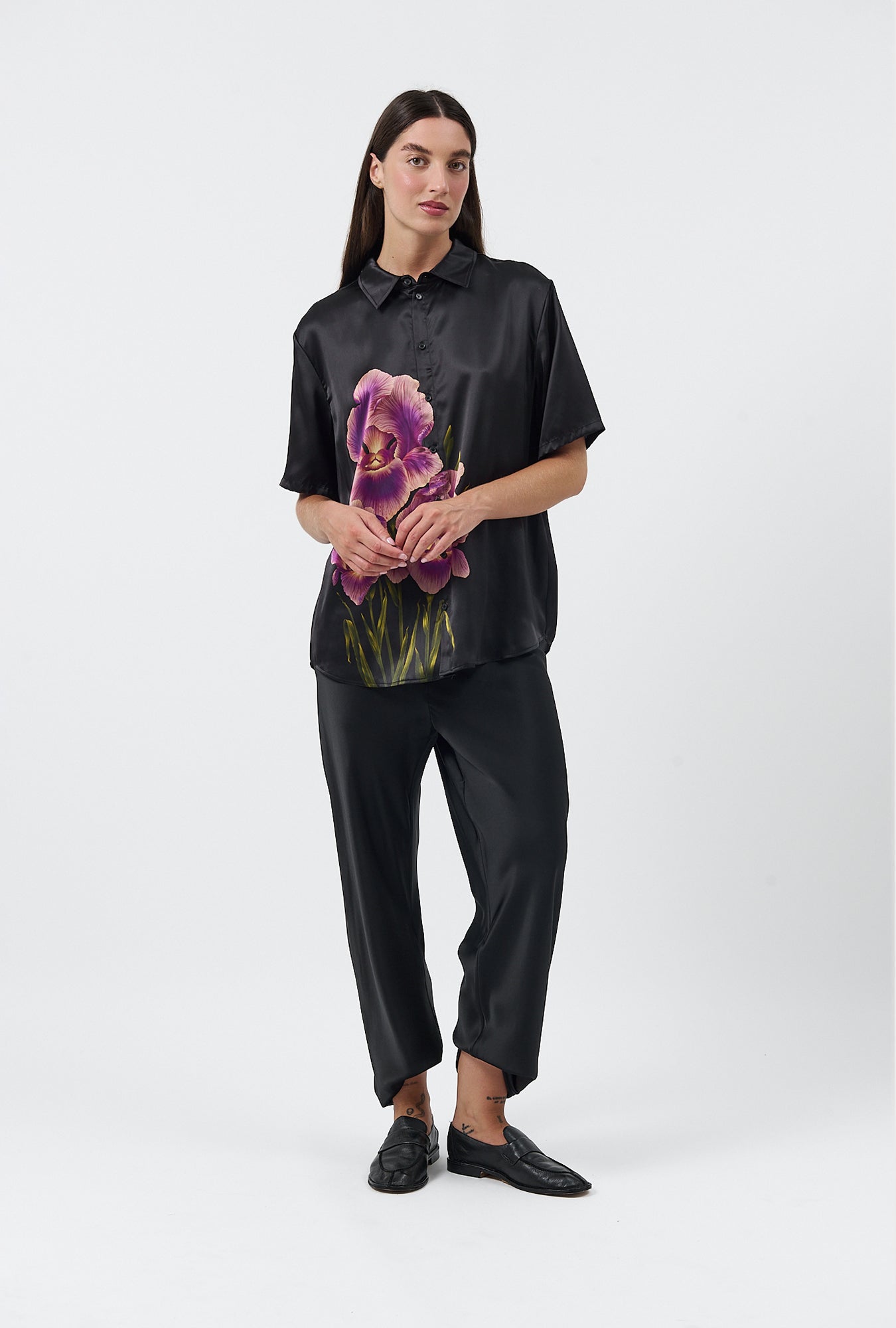 Image of a model wearing Tops. Product name - Short Sleeve Boyfriend Shirt Iris in Iris colour by brand - Silk Laundry