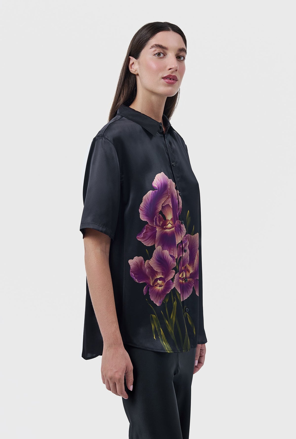 Image of a model wearing Tops. Product name - Short Sleeve Boyfriend Shirt Iris in Iris colour by brand - Silk Laundry