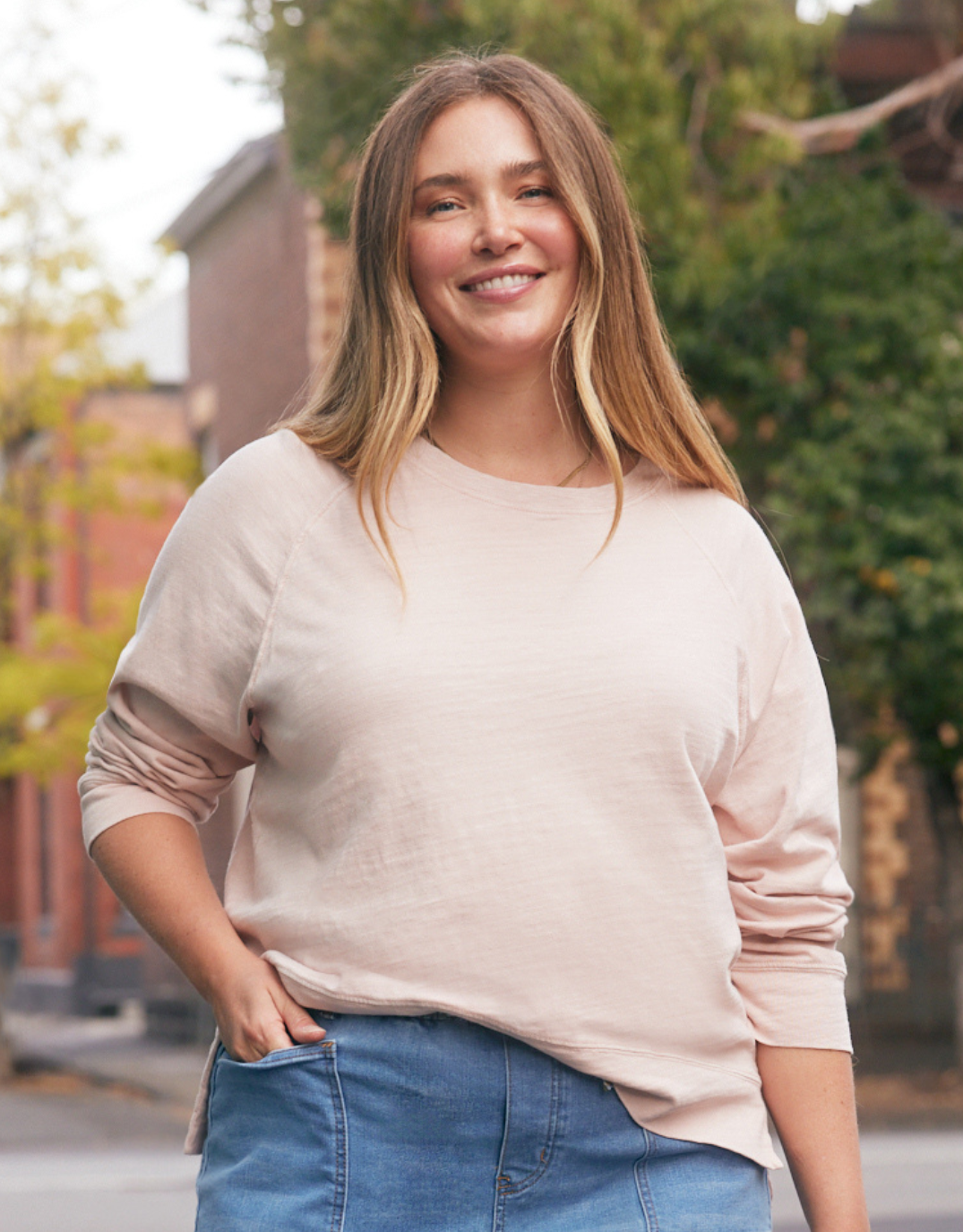 Image of a model wearing Tops. Product name - Sunset Throw On Top Dusty Pink in Dusty Pink colour by brand - White & Co.