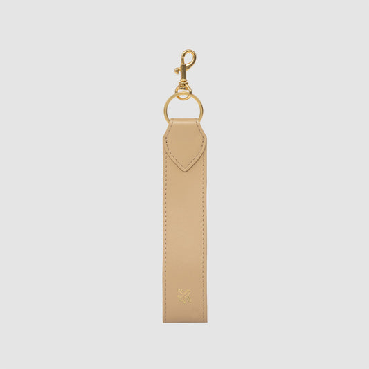 Image of Accessories. Productname: The Daily Edited Era Wristlet Keyring Latte in Latte colour by brand - The Daily Edited