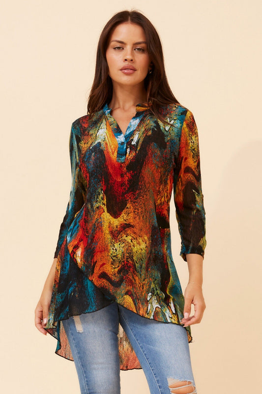 Image of a model wearing Tops. Product name - VICKY ABSTRACT PRINT TOP in Multi Red colour by brand - Caroline Morgan Australia