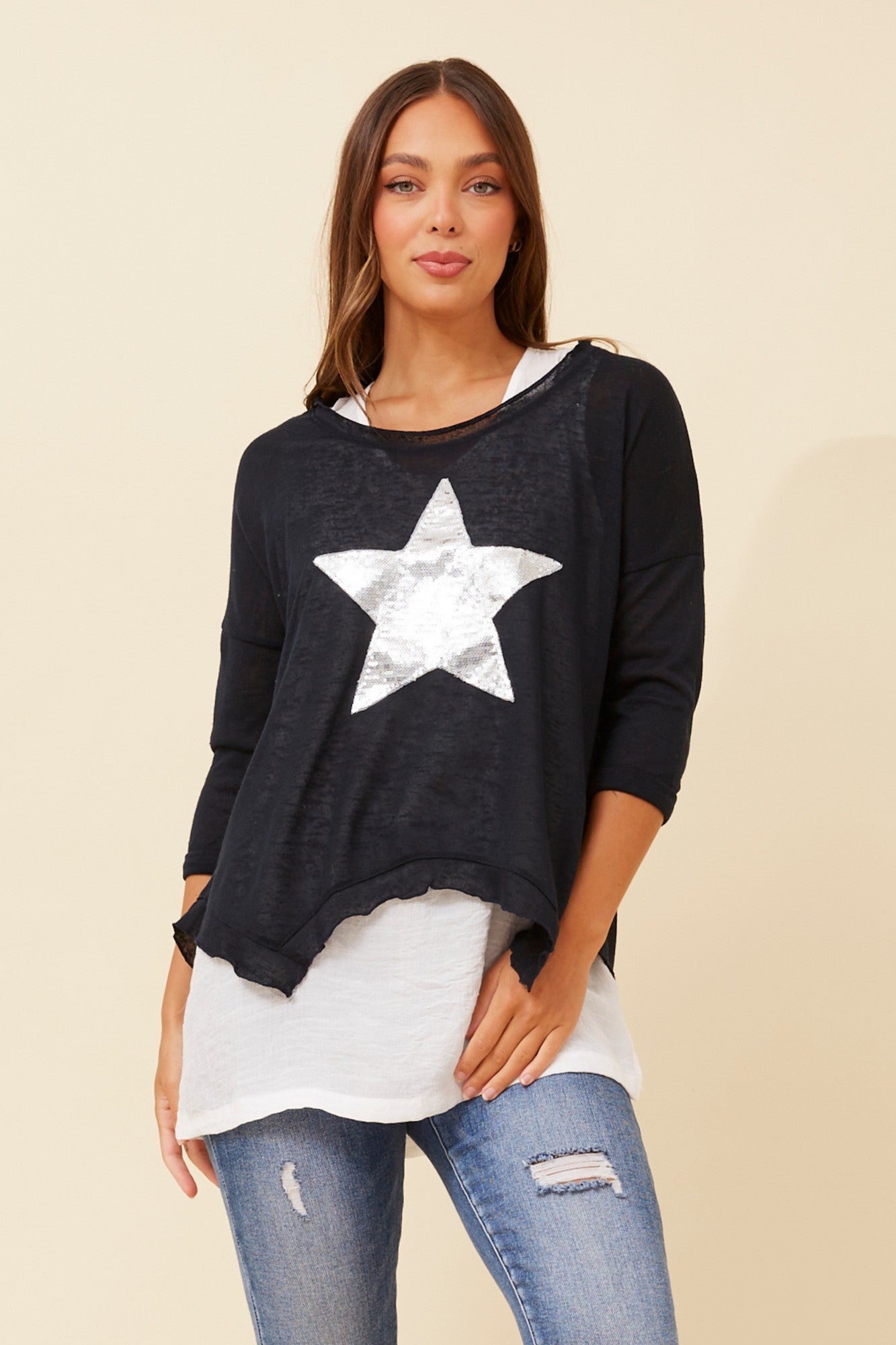 Image of a model wearing Tops. Product name - CLARITY DOUBLE LAYER TOP in Emerald colour by brand - Caroline Morgan Australia