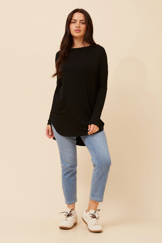 Image of a model wearing Tops. Product name - SKYE SOLID TOP in Black colour by brand - Caroline Morgan Australia