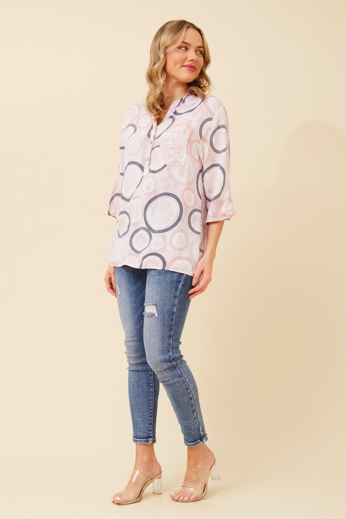 Image of a model wearing Tops. Product name - ROSETTA SEQUIN DETAIL TOP in Blue colour by brand - BOTTEGA MODA
