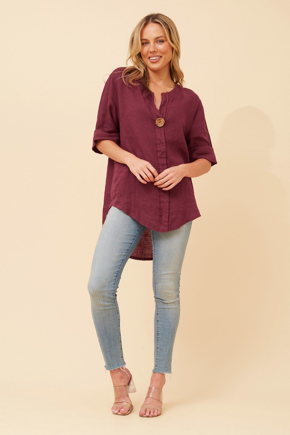 Image of a model wearing Tops. Product name - PALERMO LINEN TOP in Black colour by brand - BOTTEGA MODA