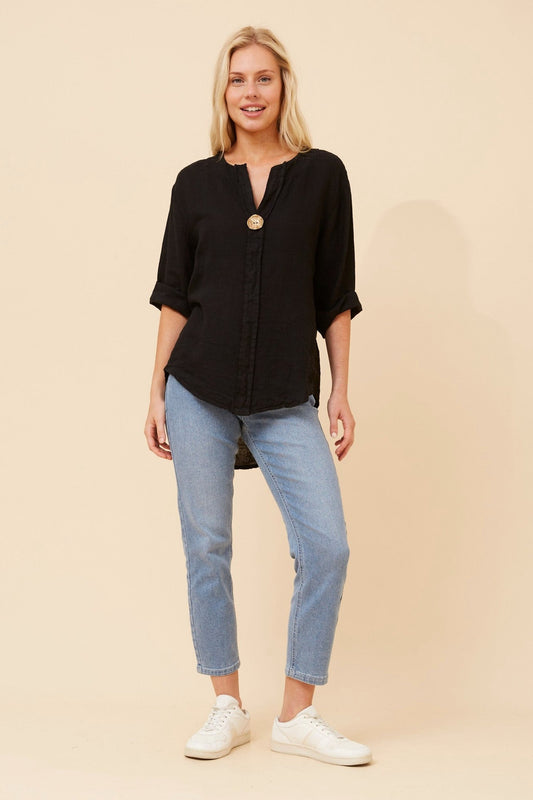 Image of a model wearing Tops. Product name - PALERMO LINEN TOP in Black colour by brand - BOTTEGA MODA