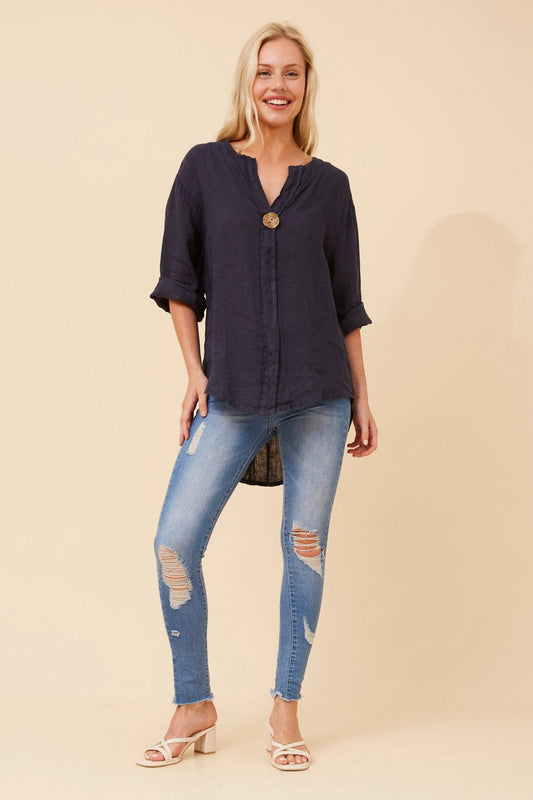 Image of a model wearing Tops. Product name - PALERMO LINEN TOP in Navy colour by brand - BOTTEGA MODA