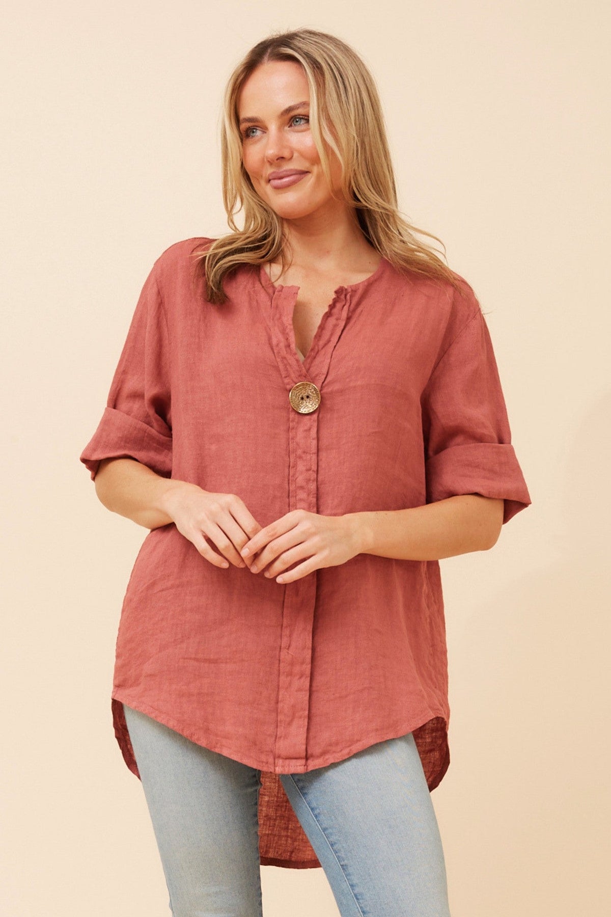 Image of a model wearing Tops. Product name - PALERMO LINEN TOP in Rosewood colour by brand - BOTTEGA MODA
