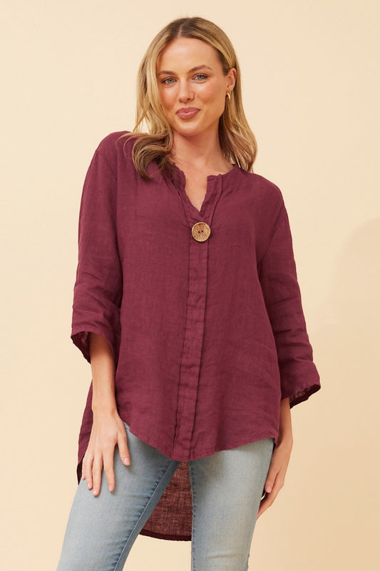 Image of a model wearing Tops. Product name - PALERMO LINEN TOP in Wine colour by brand - BOTTEGA MODA