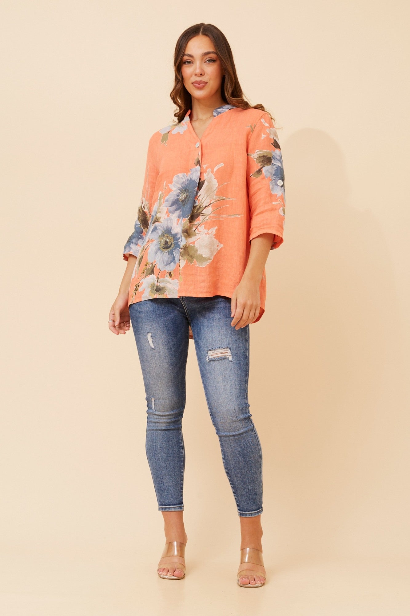 Image of a model wearing Tops. Product name - PATRICIA FLORAL LINEN TOP in Sage colour by brand - BOTTEGA MODA