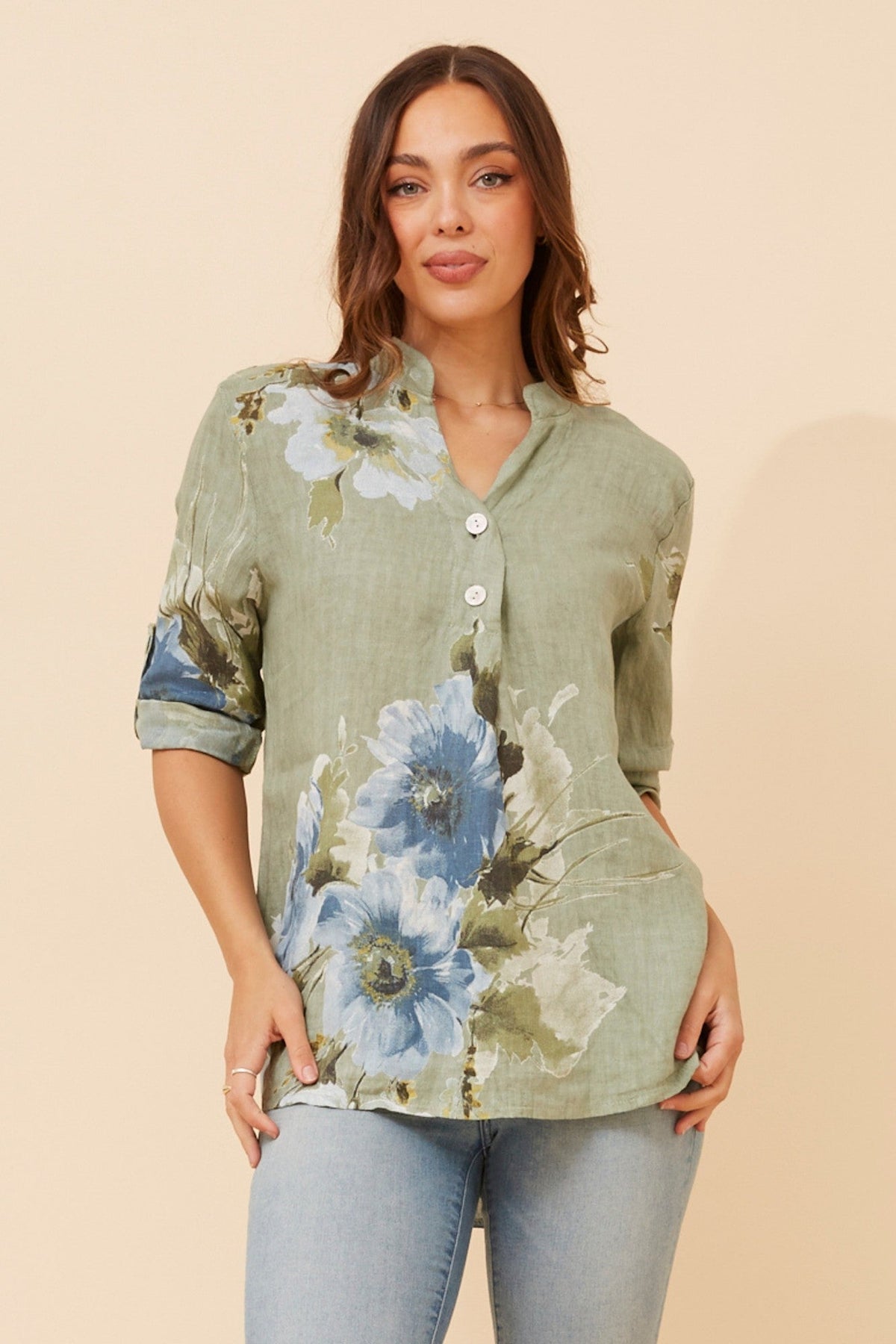 Image of a model wearing Tops. Product name - PATRICIA FLORAL LINEN TOP in Sage colour by brand - BOTTEGA MODA