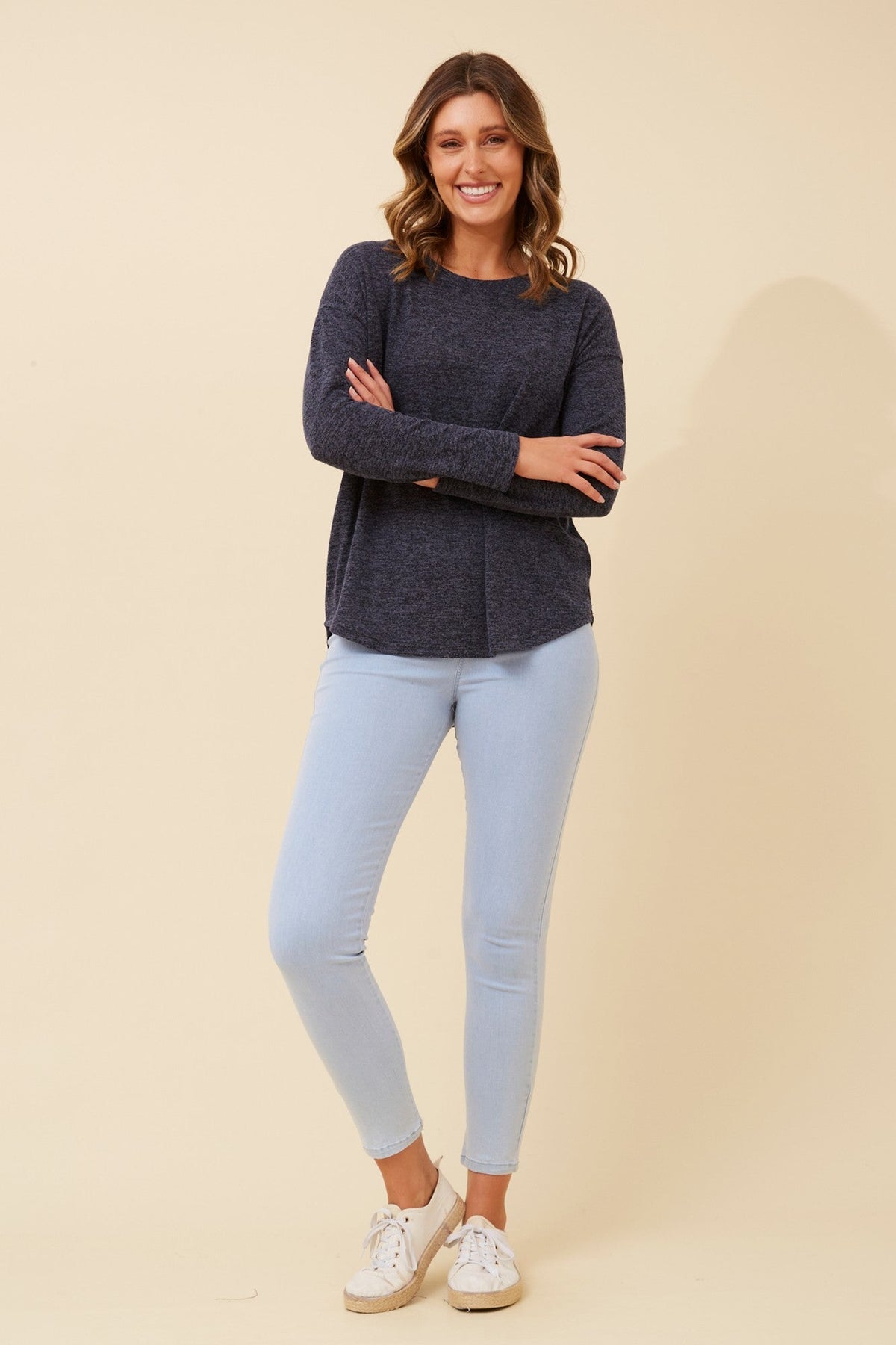 Image of a model wearing Tops. Product name - EVA SOLID TOP in Khaki colour by brand - Caroline Morgan Australia