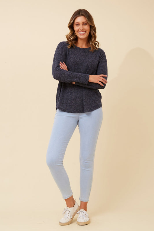 Image of a model wearing Tops. Product name - EVA SOLID TOP in Khaki colour by brand - Caroline Morgan Australia