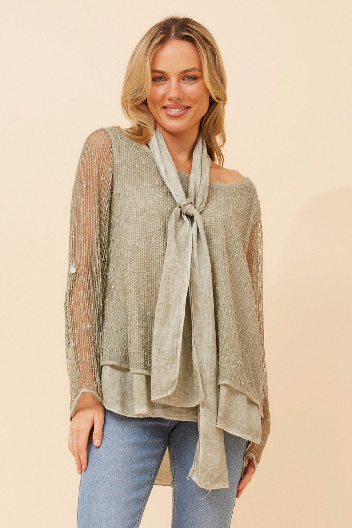 Image of a model wearing Tops. Product name - GRAZIELLA DOUBLE LAYERED TOP in Navy colour by brand - BOTTEGA MODA