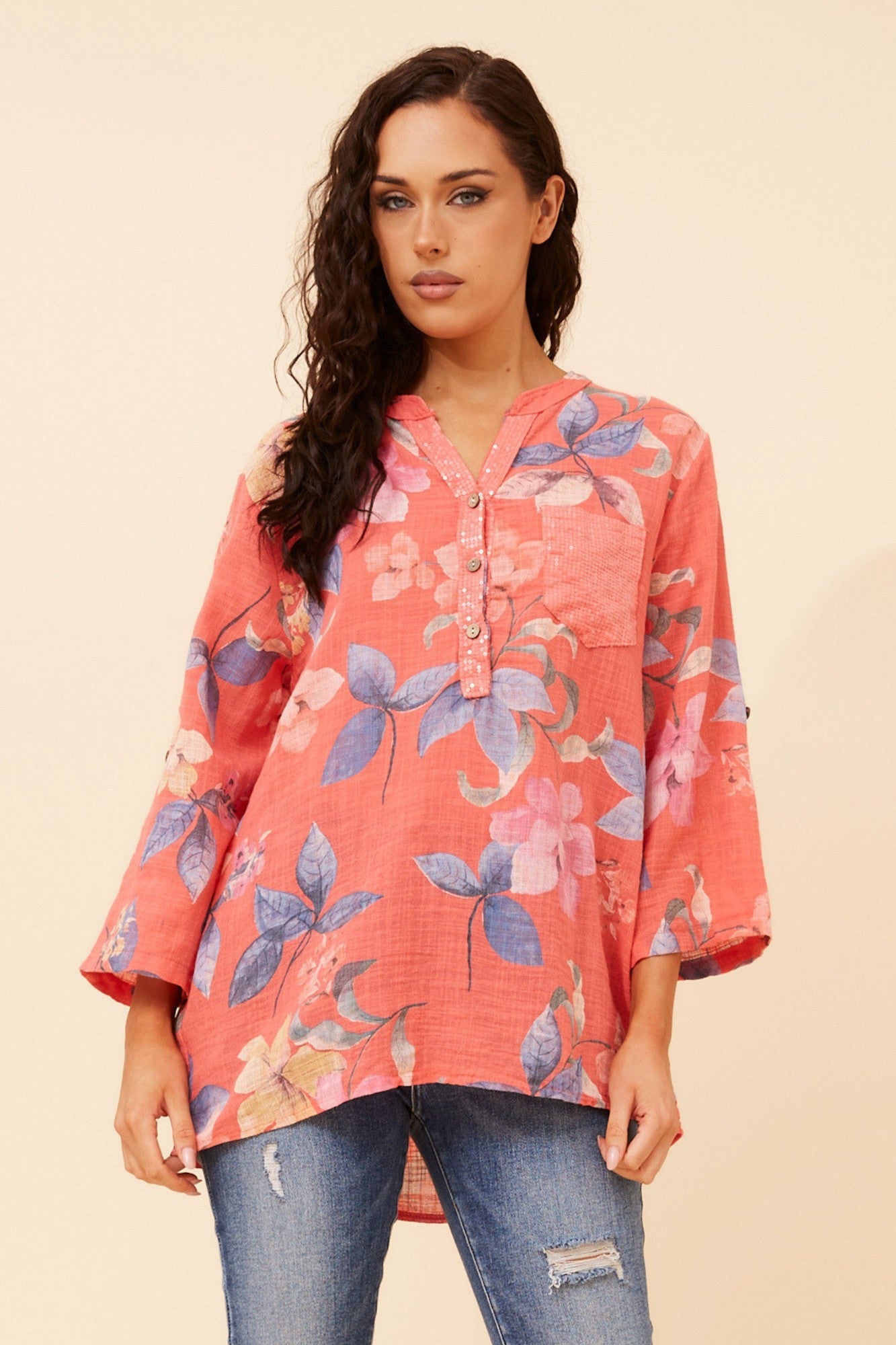 Image of a model wearing Tops. Product name - ROSETTA FLORAL TOP in Light Denim colour by brand - BOTTEGA MODA