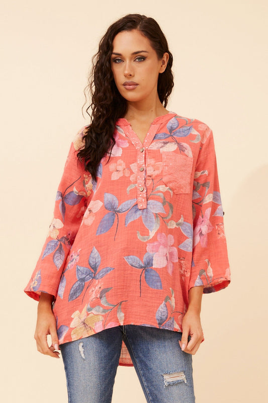 Image of a model wearing Tops. Product name - ROSETTA FLORAL TOP in Light Denim colour by brand - BOTTEGA MODA