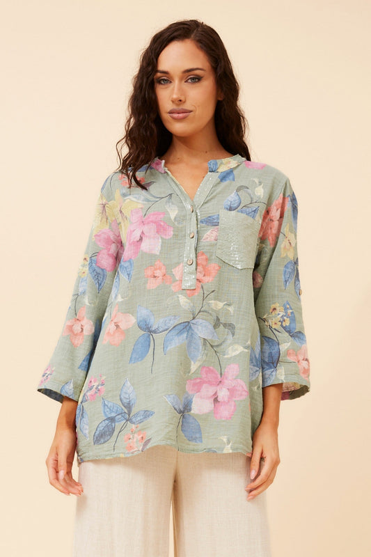 Image of a model wearing Tops. Product name - ROSETTA FLORAL TOP in Sage colour by brand - BOTTEGA MODA