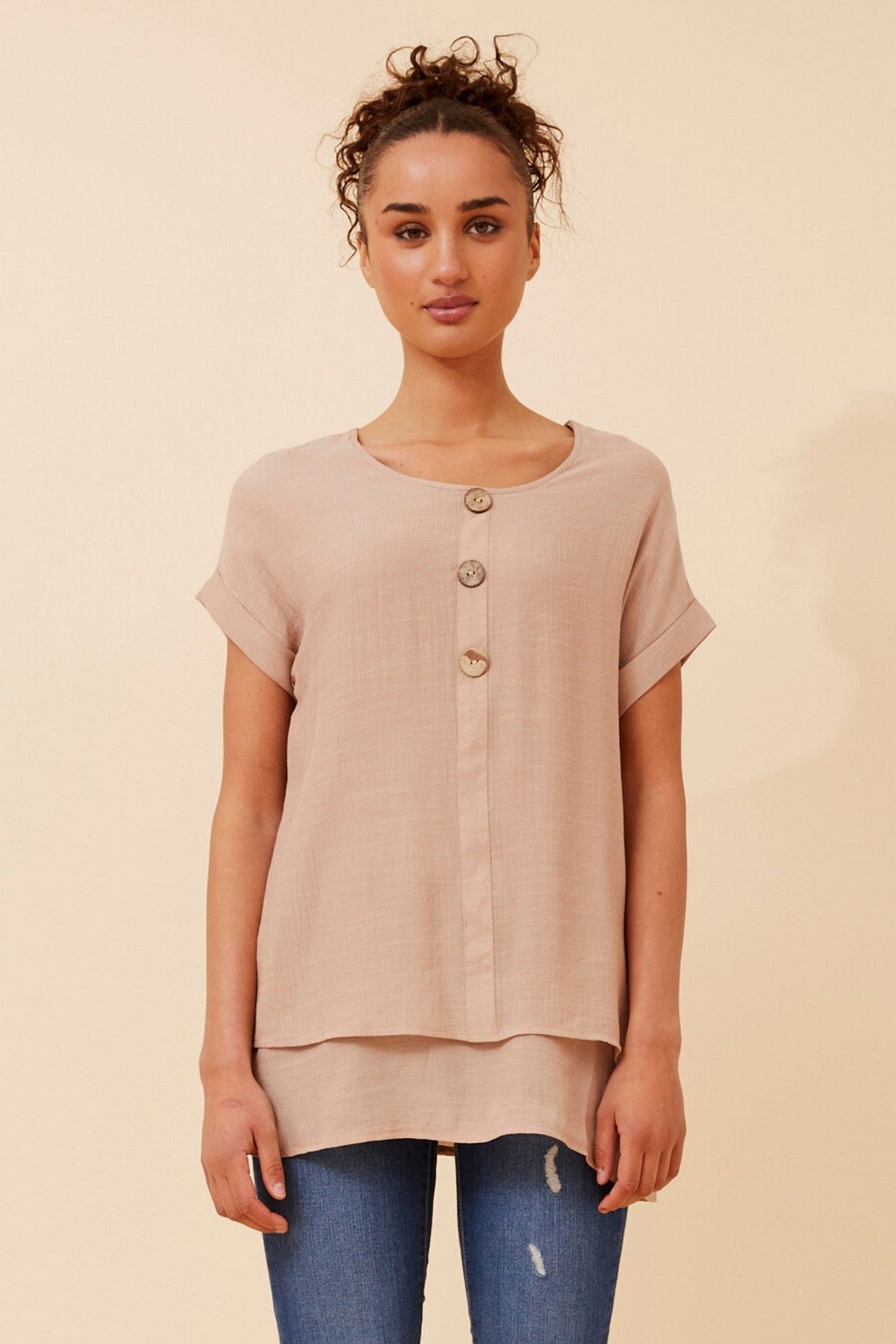 Image of a model wearing Tops. Product name - JAYCEE SOLID TOP in Green Ash colour by brand - Caroline Morgan Australia