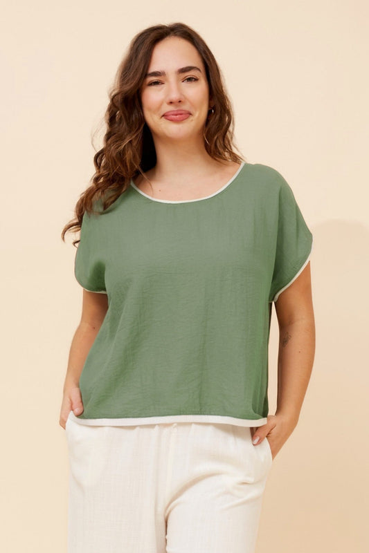 Image of a model wearing Tops. Product name - LYNKA SOLID LINEN BLEND TOP in Khaki colour by brand - Caroline Morgan Australia