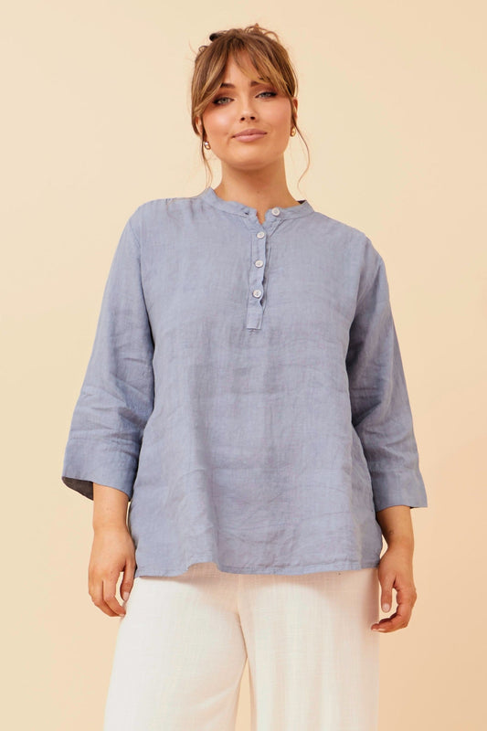 Image of a model wearing Tops. Product name - EVREN LINEN TOP in Denim colour by brand - BOTTEGA MODA
