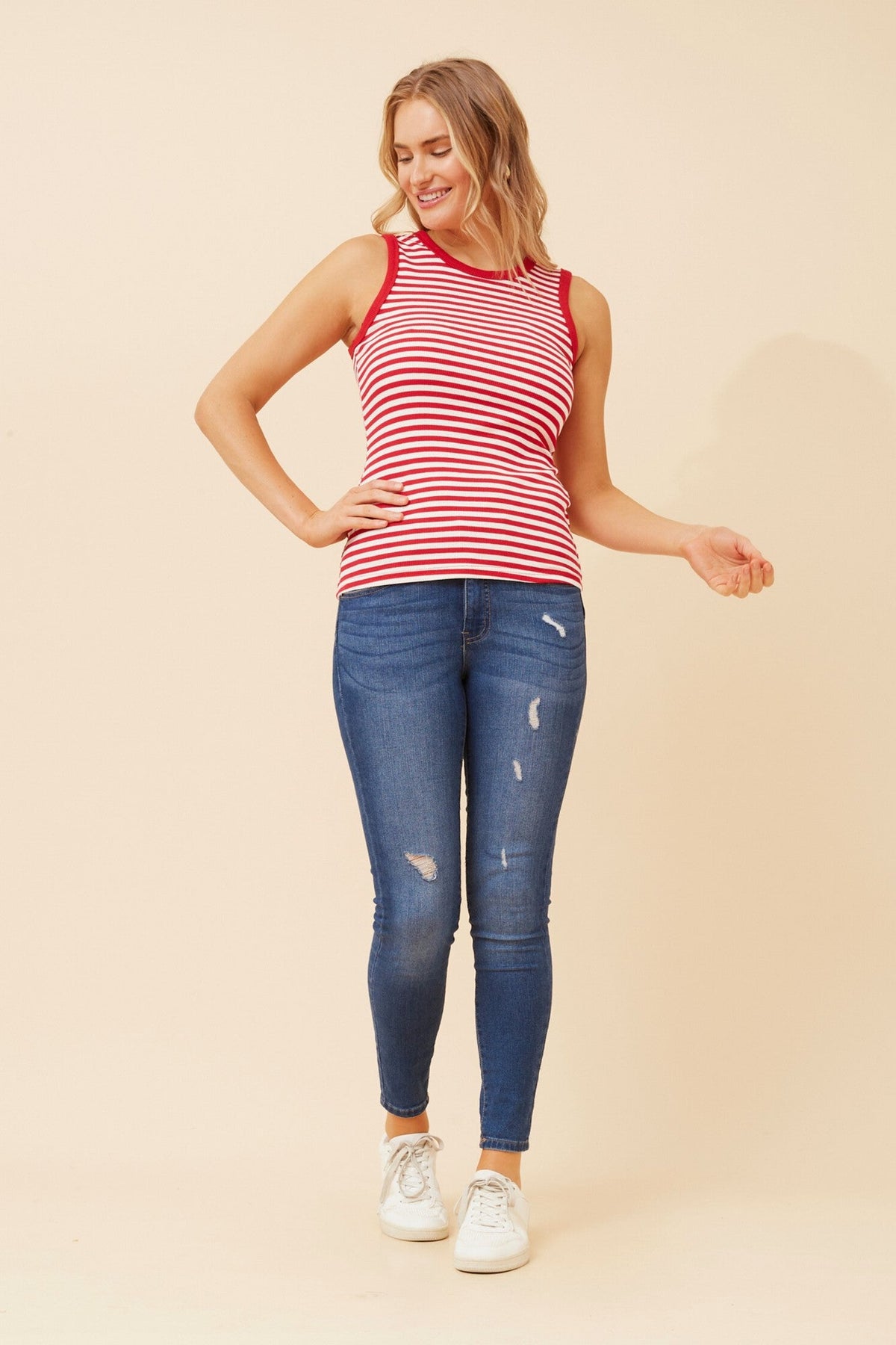 Image of a model wearing Tops. Product name - ROSEMARY STRIPE PRINT TOP in Navy colour by brand - Caroline Morgan Australia