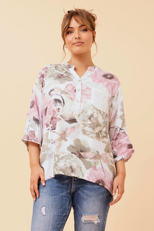 Image of a model wearing Tops. Product name - ROSETTA FLORAL PRINT TOP in White colour by brand - BOTTEGA MODA