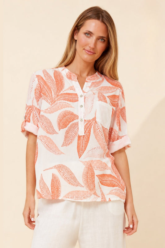 Image of a model wearing Tops. Product name - ROSETTA LEAF PRINT TOP in Dusty Pink colour by brand - BOTTEGA MODA