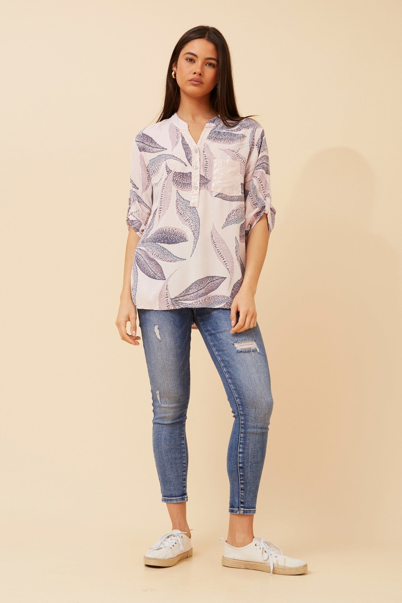 Image of a model wearing Tops. Product name - ROSETTA LEAF PRINT TOP in Dusty Pink colour by brand - BOTTEGA MODA