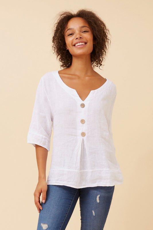 Image of a model wearing Tops. Product name - ETNA SOLID LINEN TOP in White colour by brand - BOTTEGA MODA