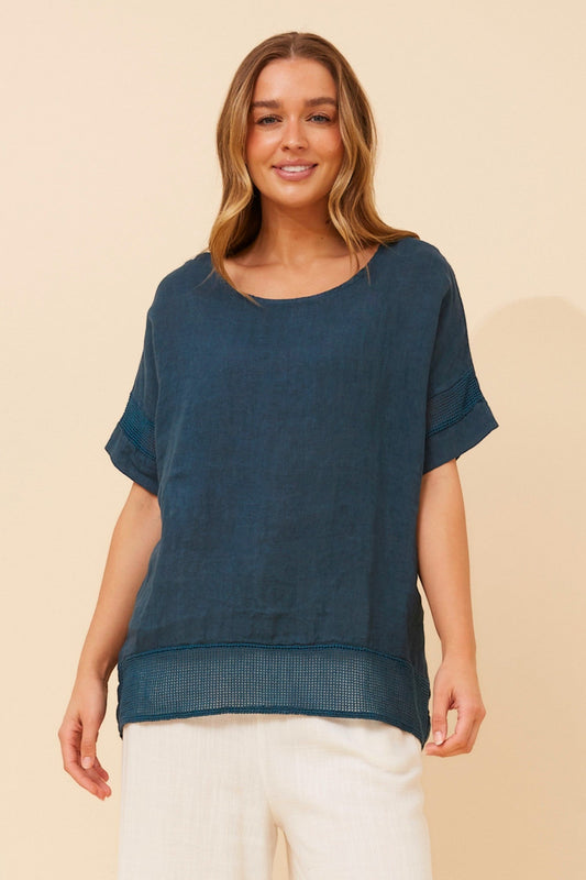 Image of a model wearing Tops. Product name - VIVALDA SOLID LINEN TOP in White colour by brand - BOTTEGA MODA