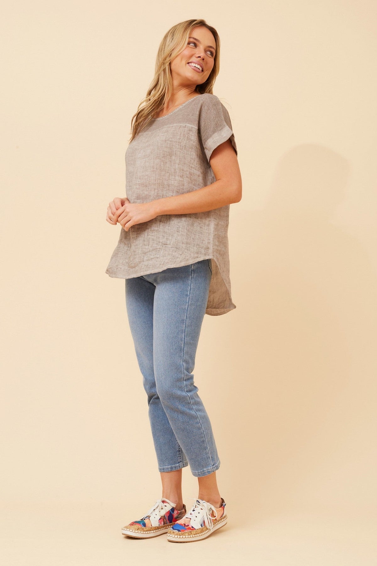 Image of a model wearing Tops. Product name - LEORA SOLID LINEN TOP in Rosewood colour by brand - BOTTEGA MODA
