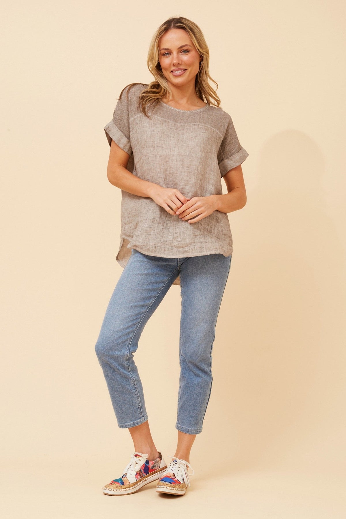 Image of a model wearing Tops. Product name - LEORA SOLID LINEN TOP in Fango colour by brand - BOTTEGA MODA