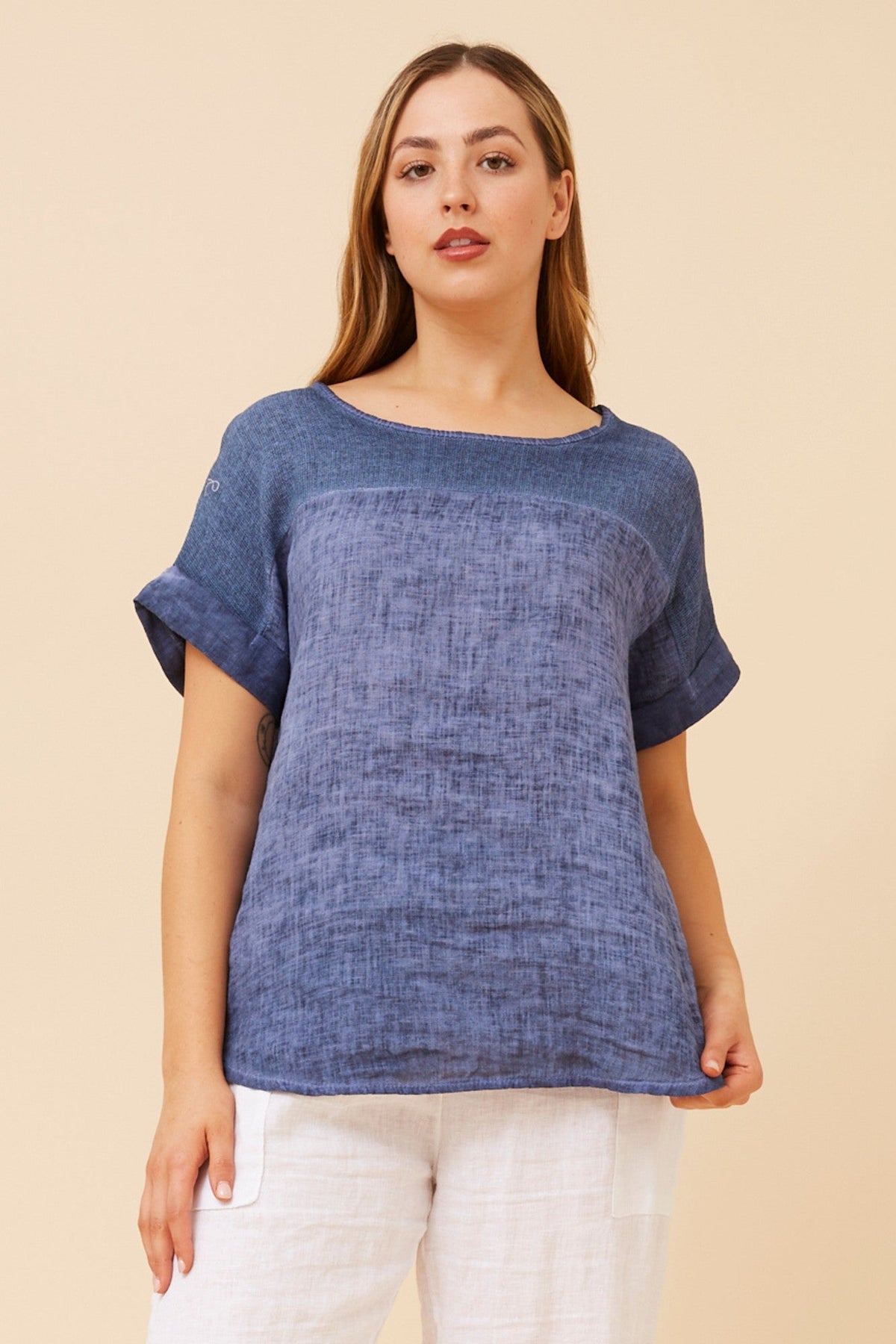 Image of a model wearing Tops. Product name - LEORA SOLID LINEN TOP in Navy colour by brand - BOTTEGA MODA