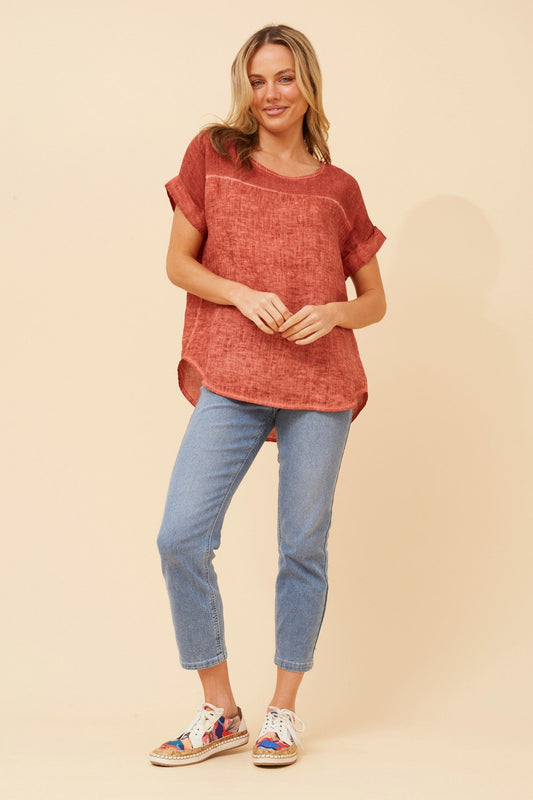 Image of a model wearing Tops. Product name - LEORA SOLID LINEN TOP in Rosewood colour by brand - BOTTEGA MODA