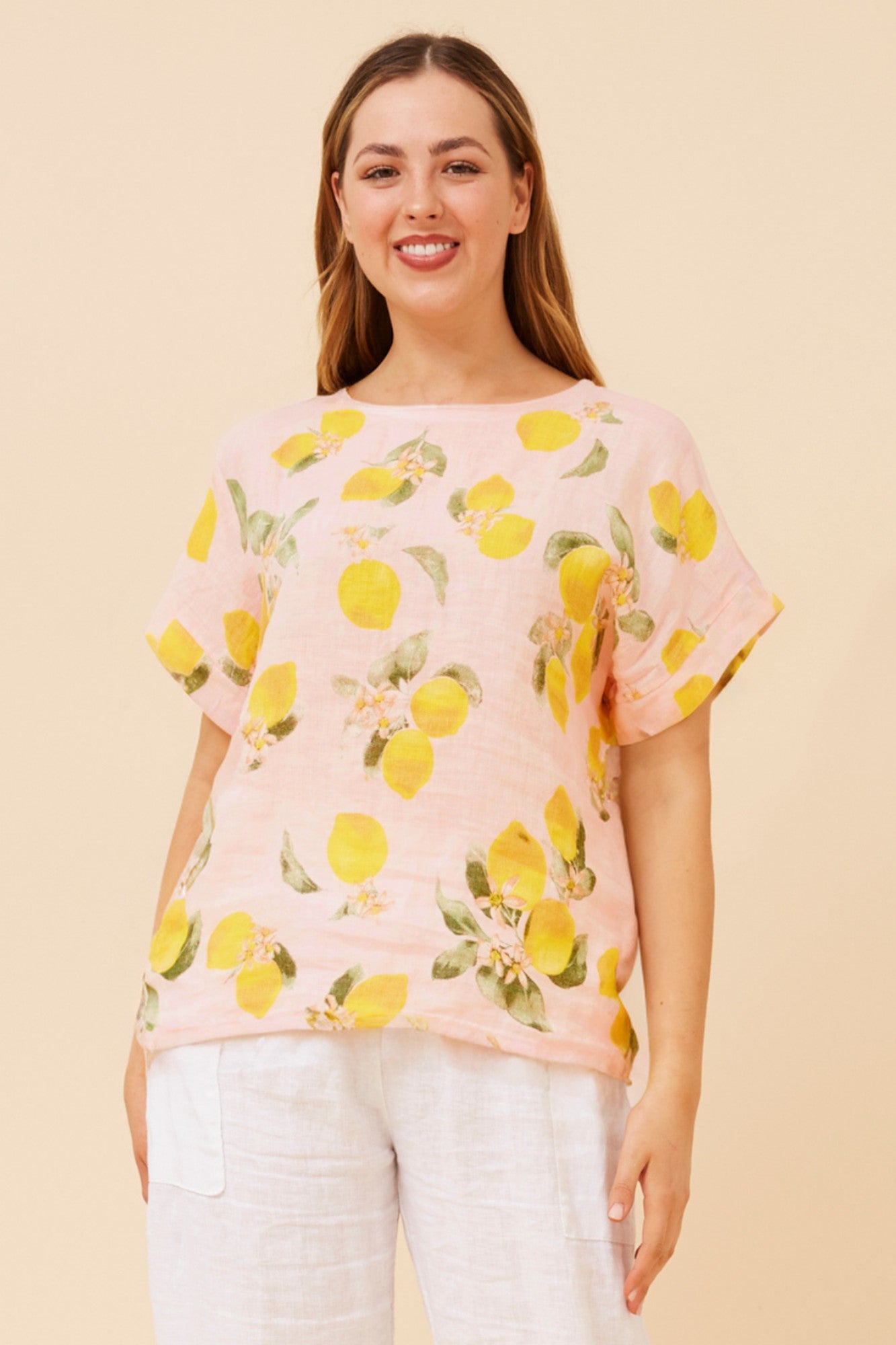 Image of a model wearing Tops. Product name - SIGRID LEMON PRINT LINEN TOP in Pink colour by brand - BOTTEGA MODA