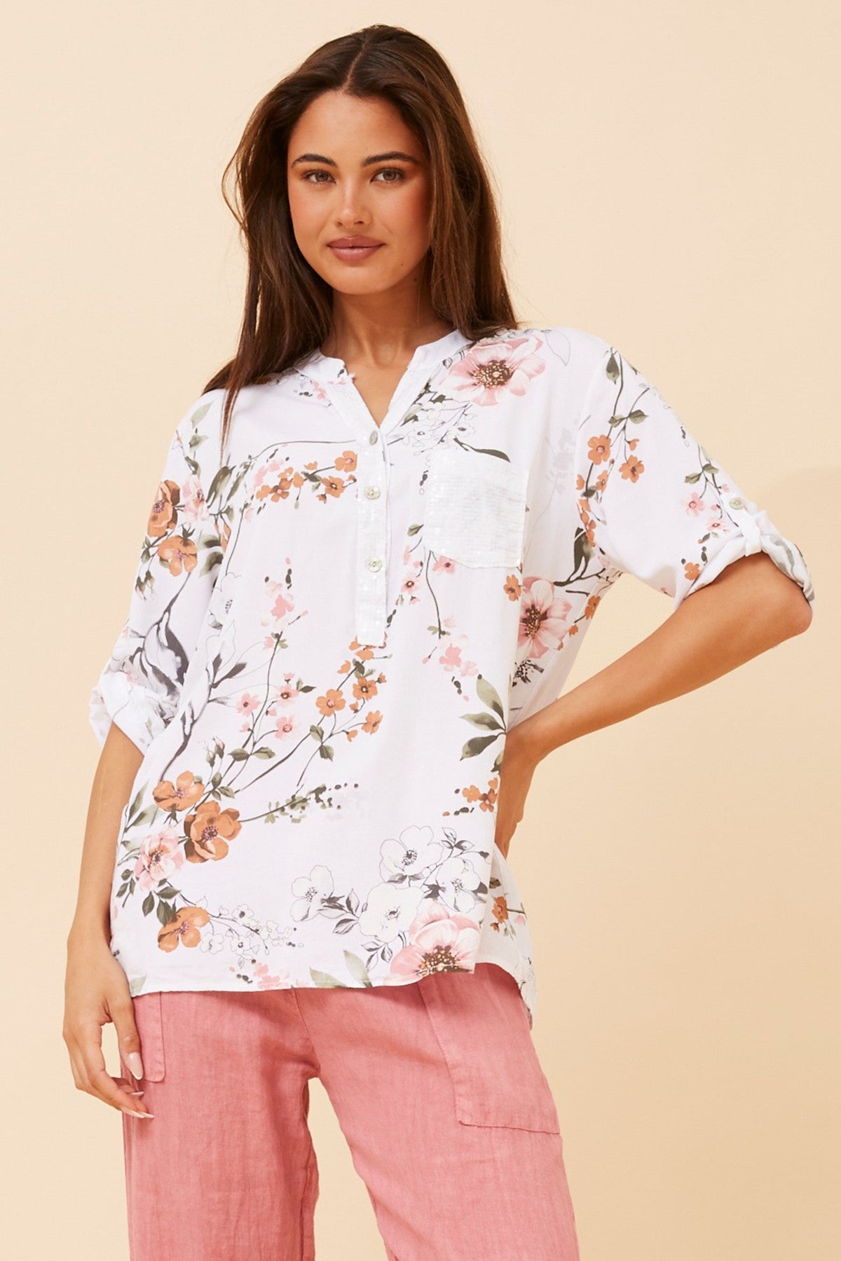 Image of a model wearing Tops. Product name - ROSETTA FLORAL TOP in Khaki colour by brand - BOTTEGA MODA