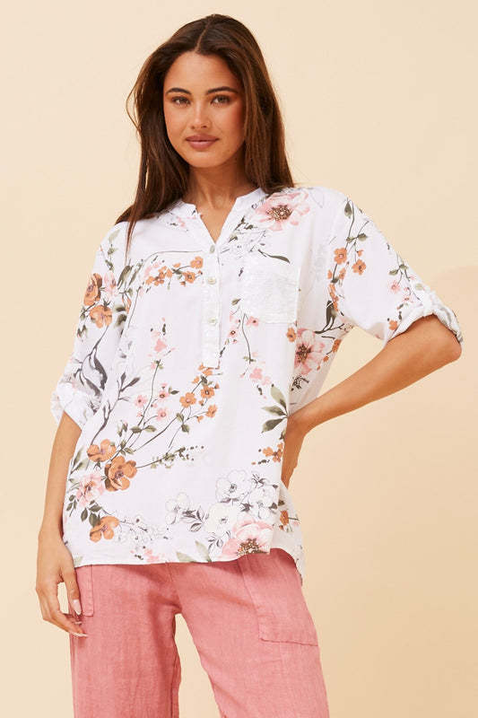 Image of a model wearing Tops. Product name - ROSETTA FLORAL TOP in Khaki colour by brand - BOTTEGA MODA