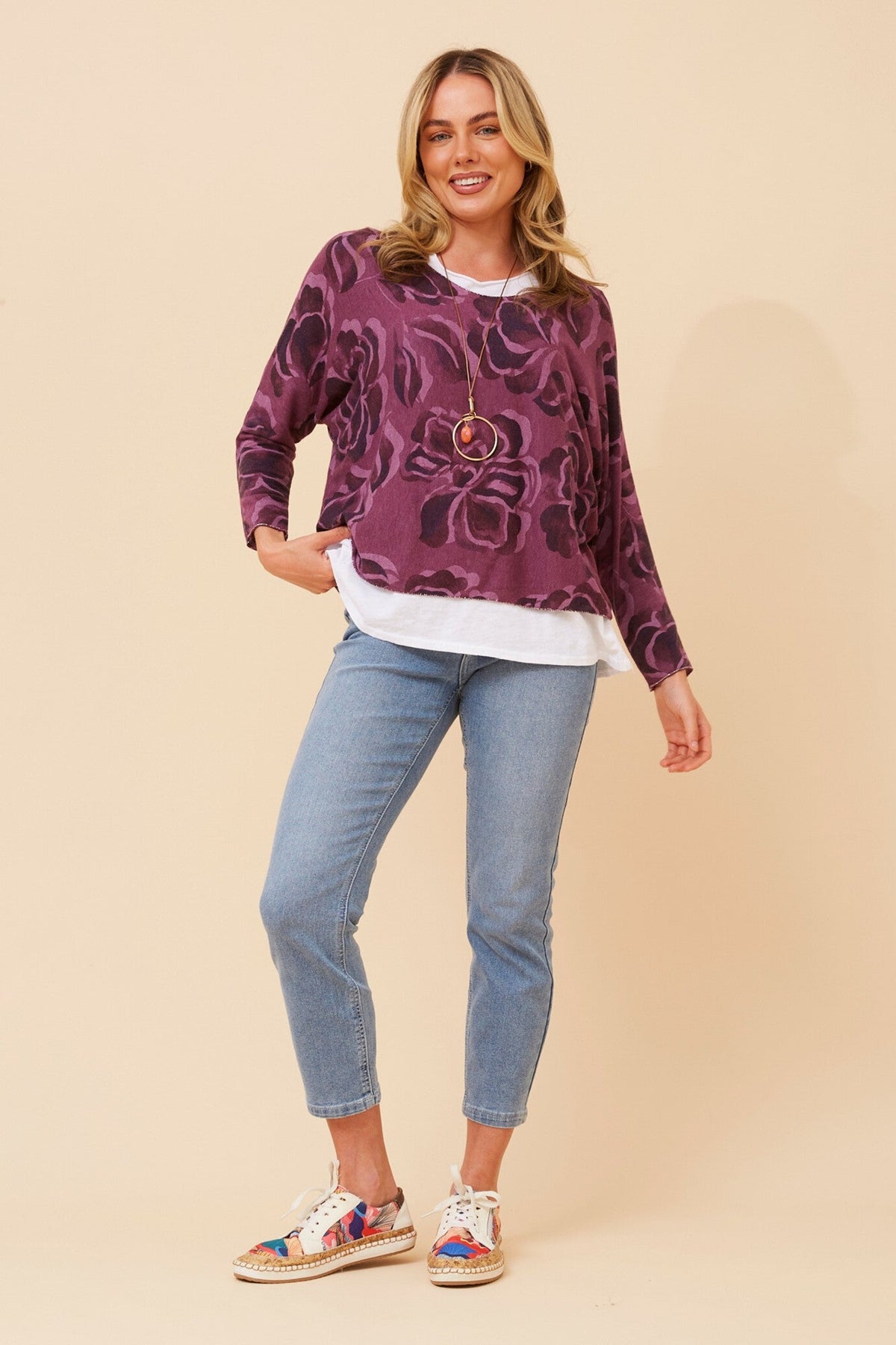 Image of a model wearing Tops. Product name - MELIKA FLORAL PRINT TOP in Chocolate colour by brand - BOTTEGA MODA