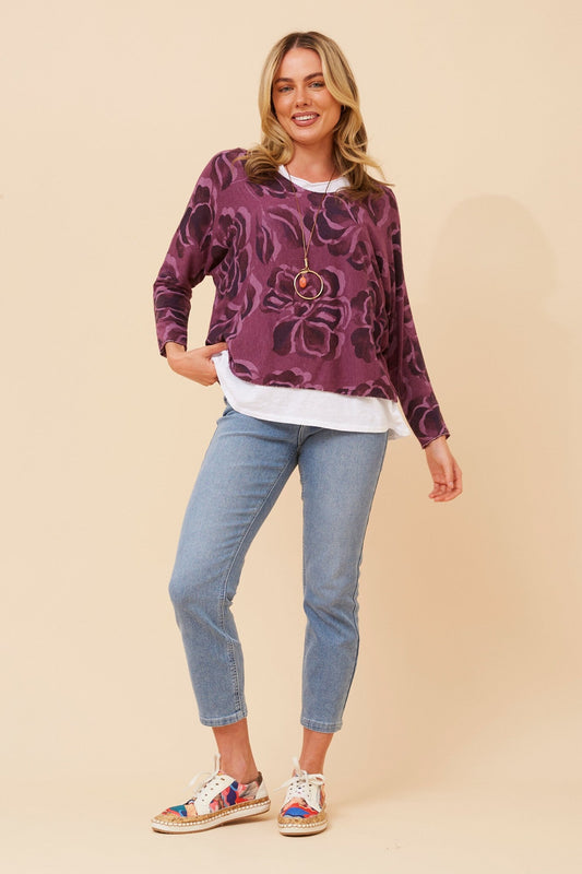 Image of a model wearing Tops. Product name - MELIKA FLORAL PRINT TOP in Chocolate colour by brand - BOTTEGA MODA