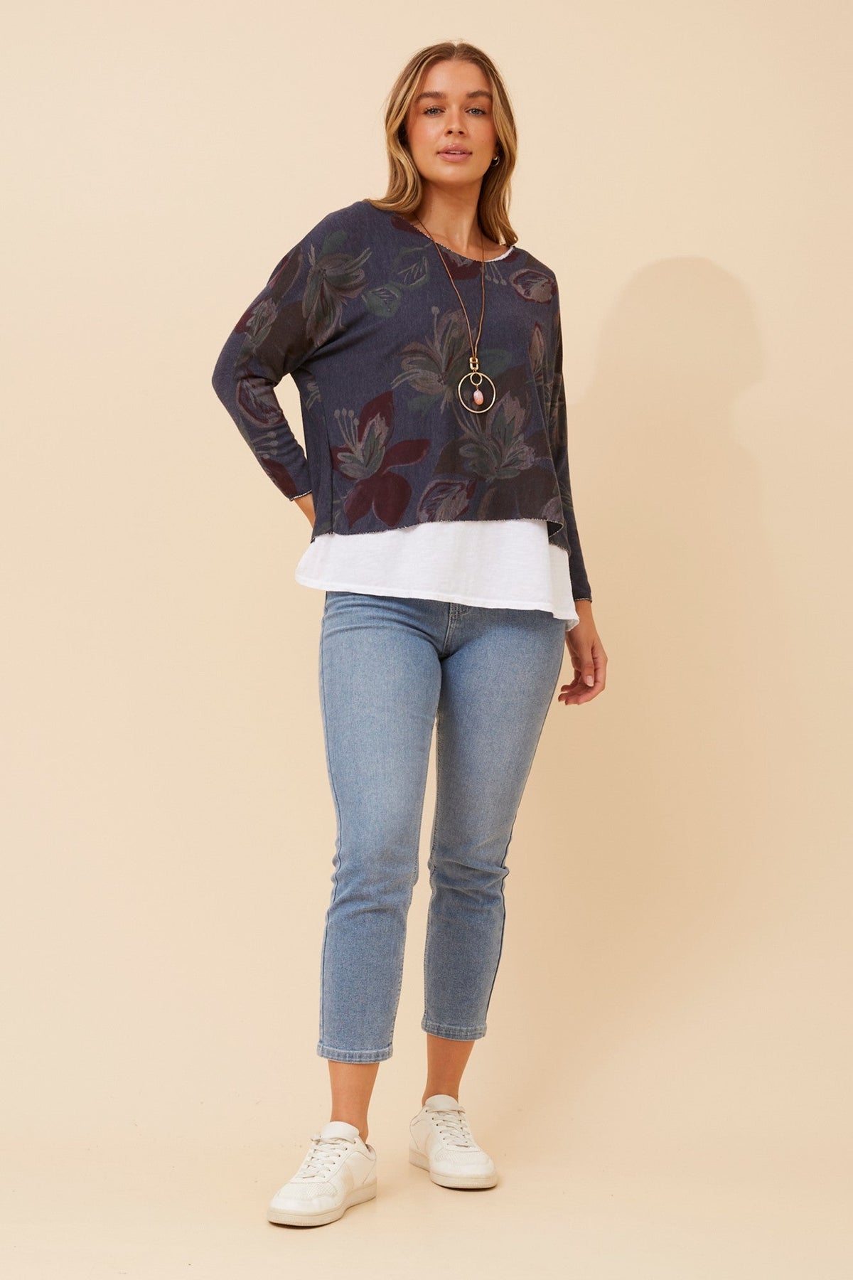 Image of a model wearing Tops. Product name - MELIKA DOUBLE LAYER TOP in Navy colour by brand - BOTTEGA MODA